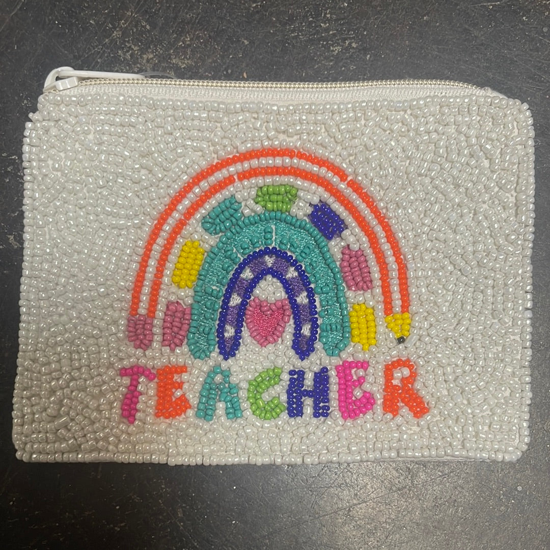 "Teacher" with a rainbow beaded coin purse.