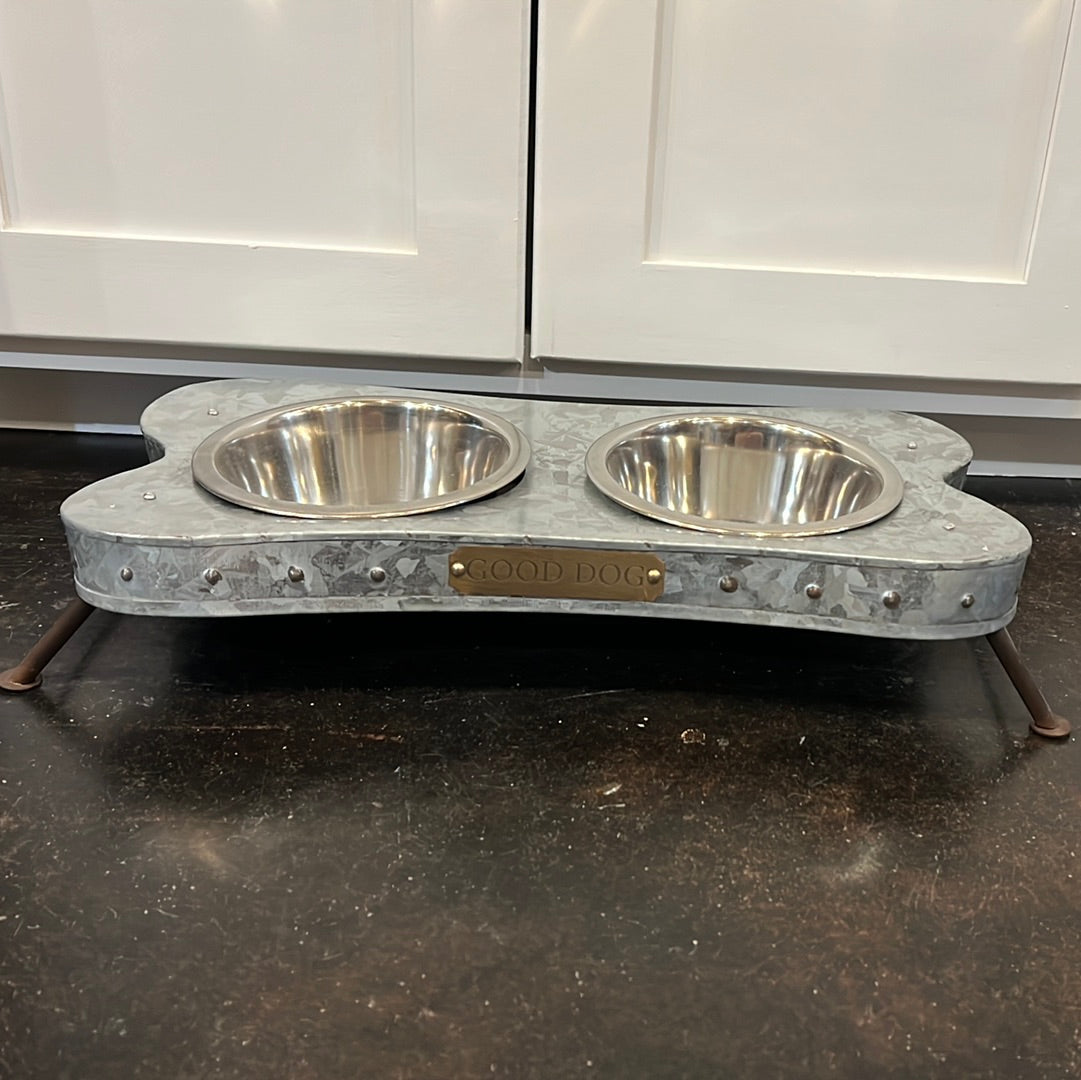 Bone shaped dog food bowl set.