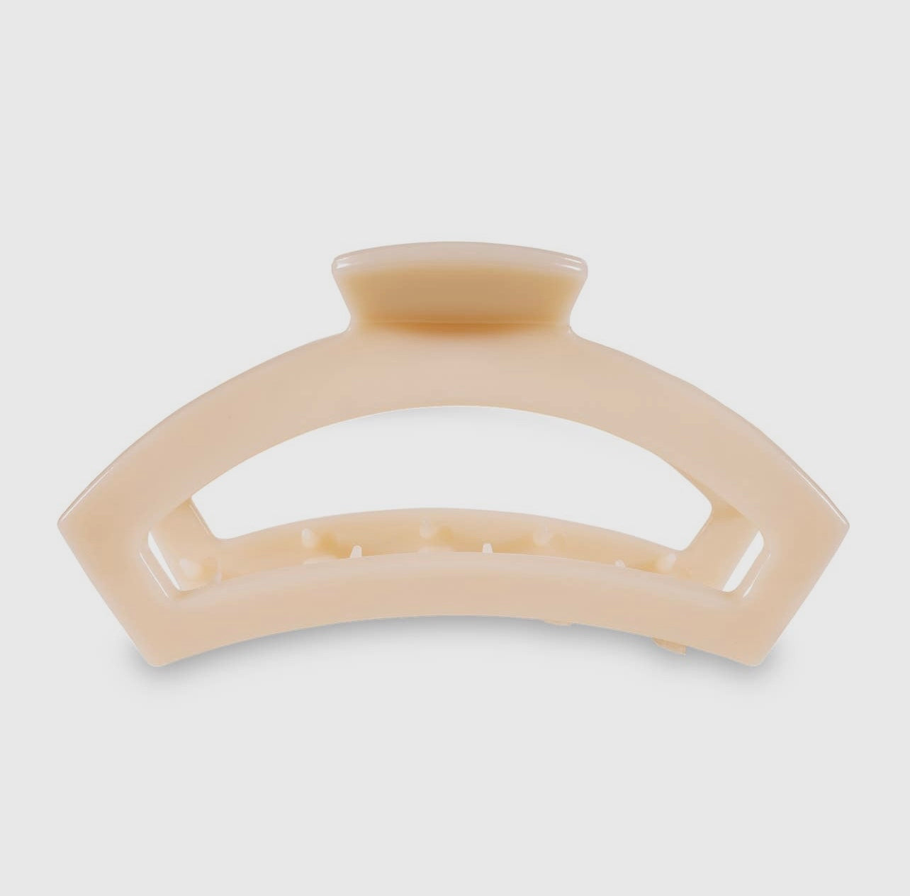 Almond beige teletie open claw clip.