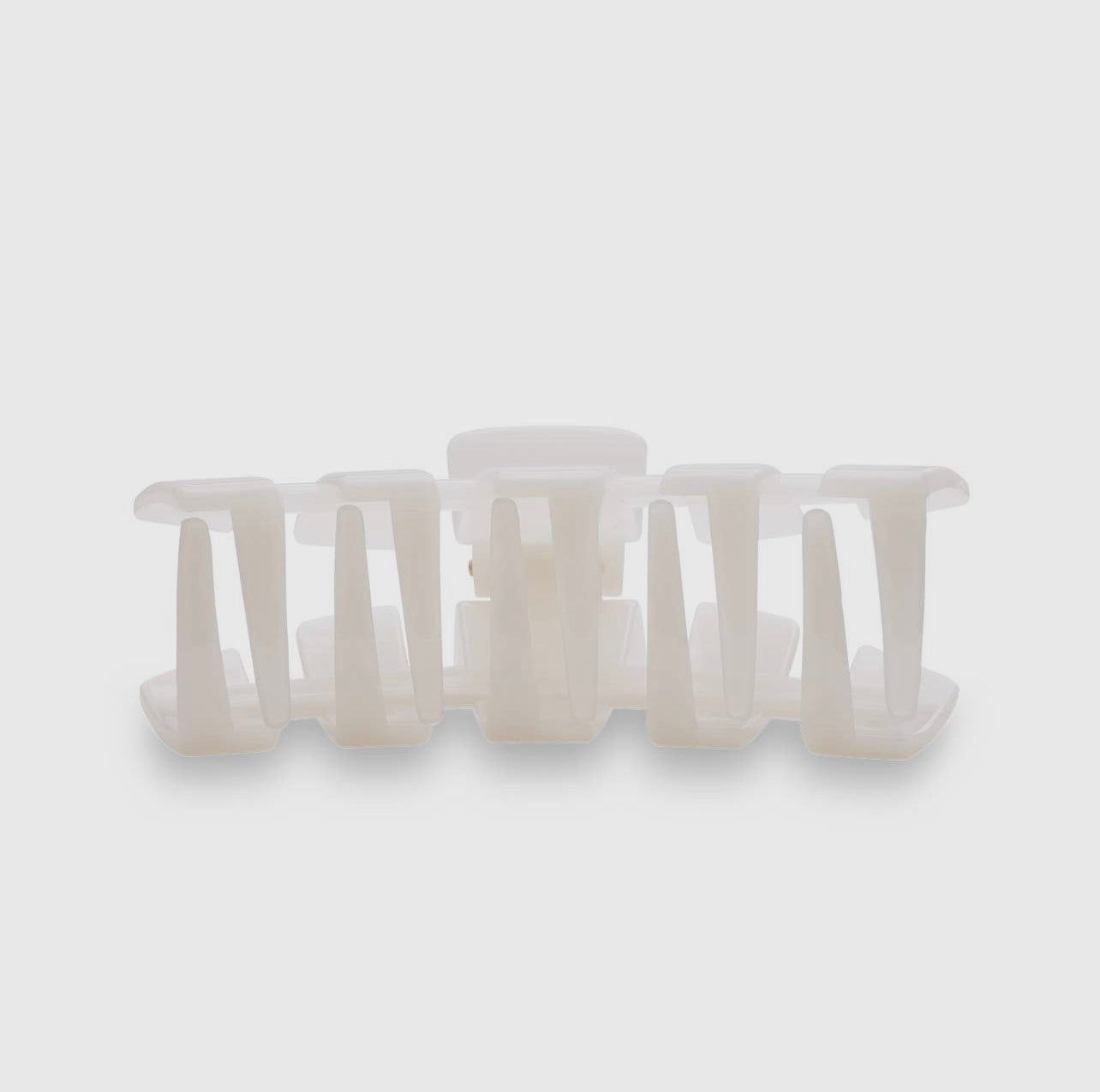 Coconut white classic teletie claw clip.