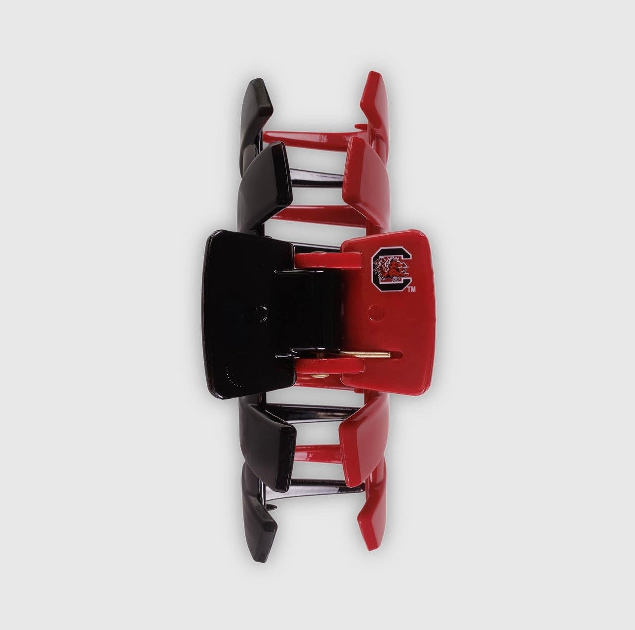 University of South Carolina Collegiate Teletie Claw Clip in garnet and black. Top view.