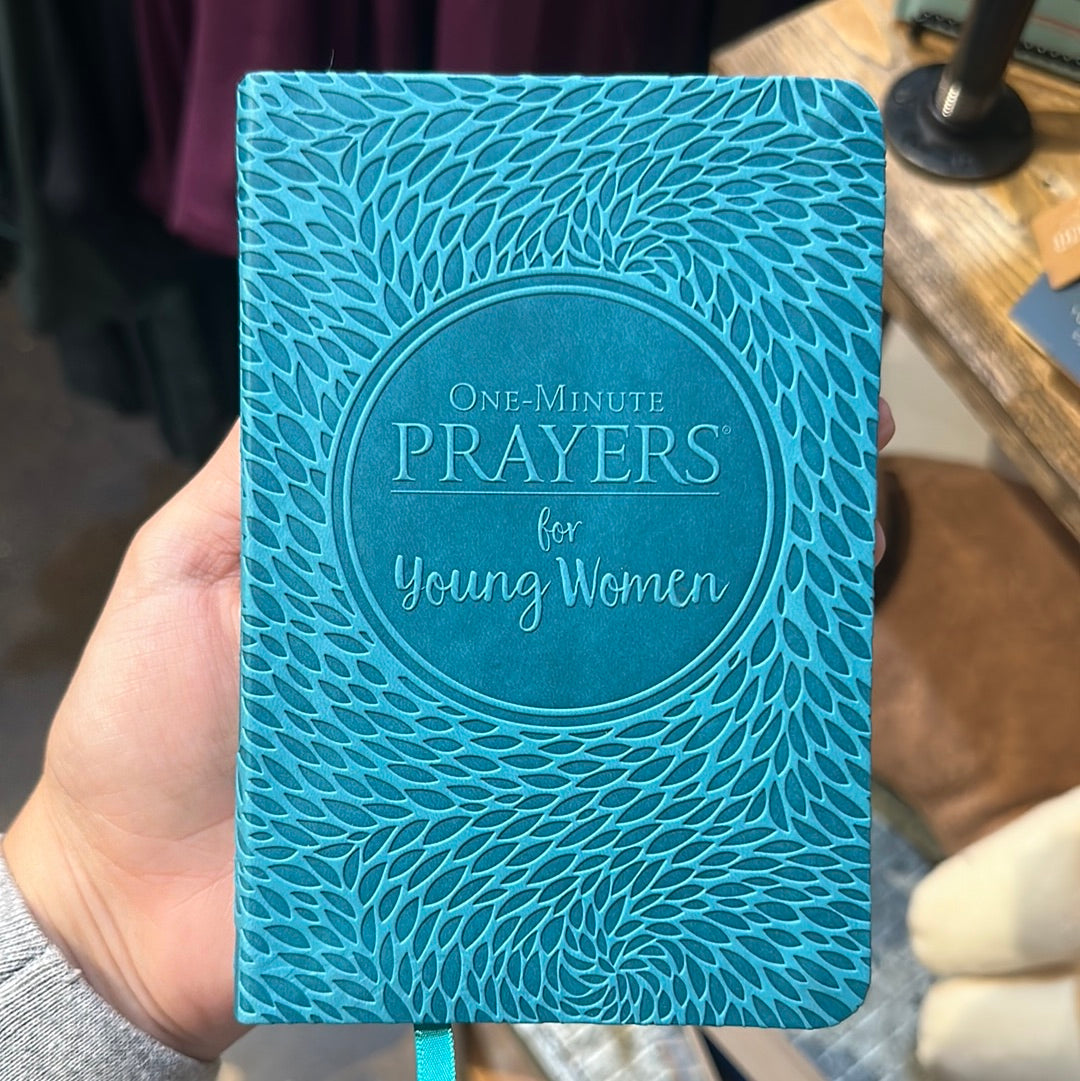 Blue book with texture, titling "One-minute Prayers for Young Women".