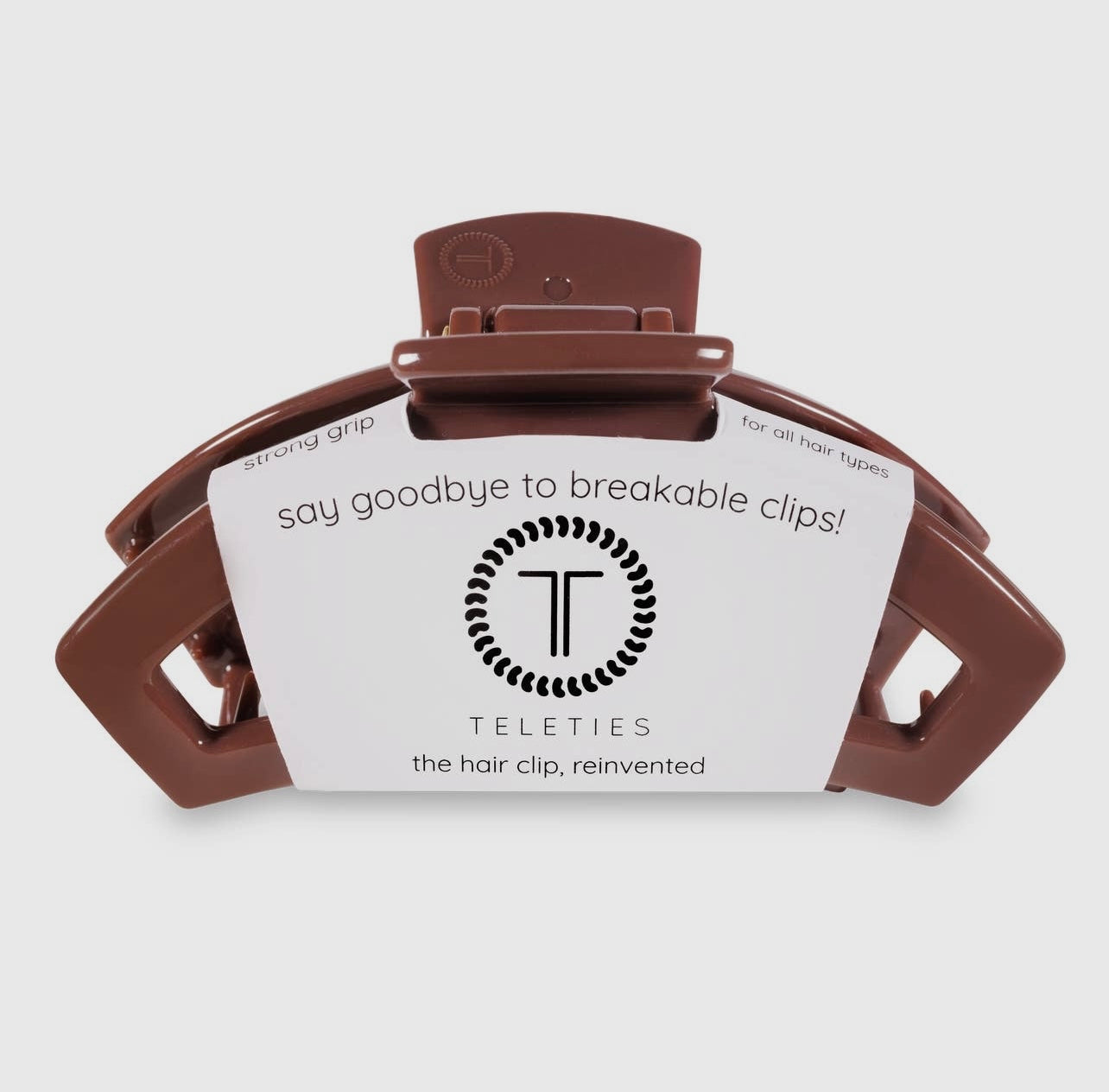 Nutmeg teletie open claw clip.