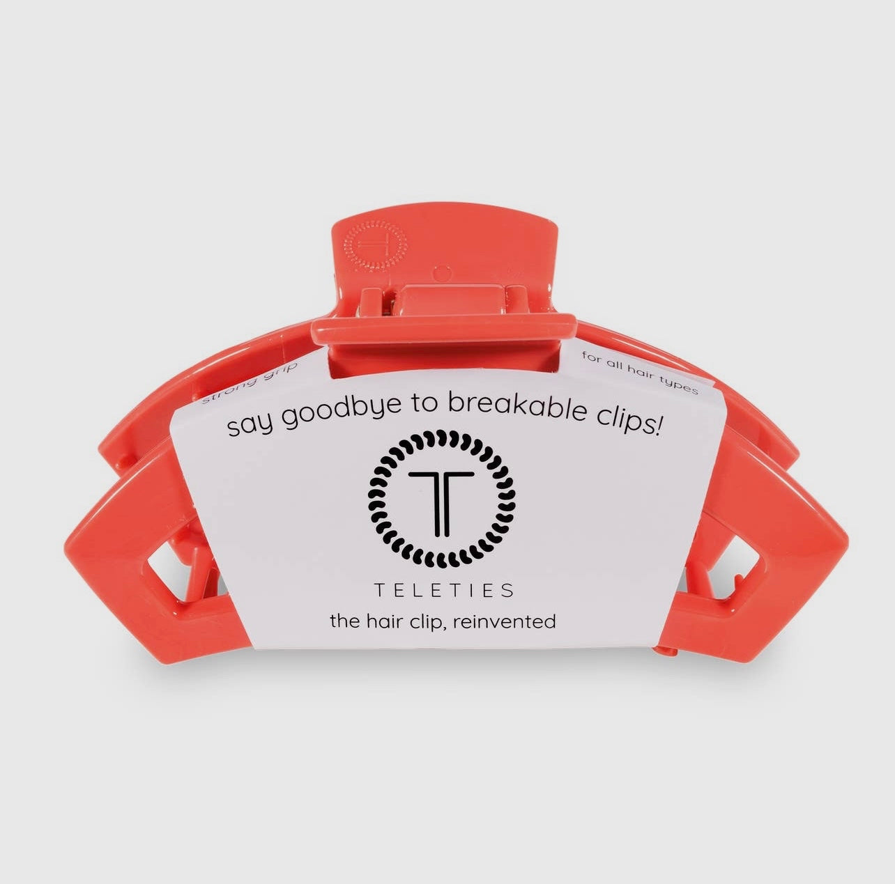 Coral teletie open claw clip.