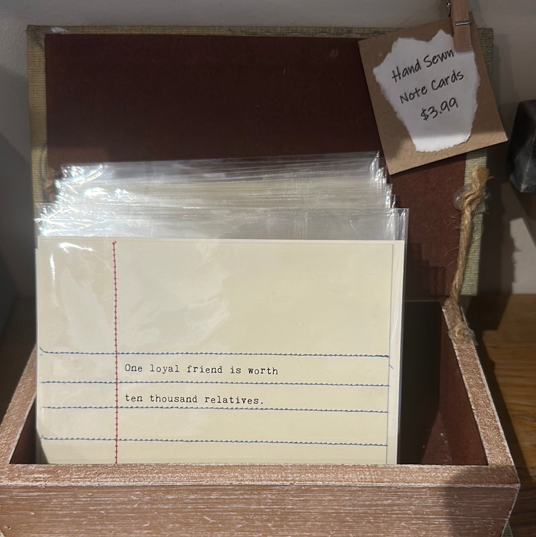 Hand sewn note cards made to look like notebook paper.