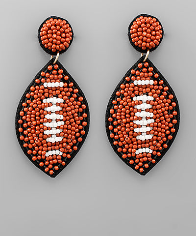 Football beaded dangle earrings.