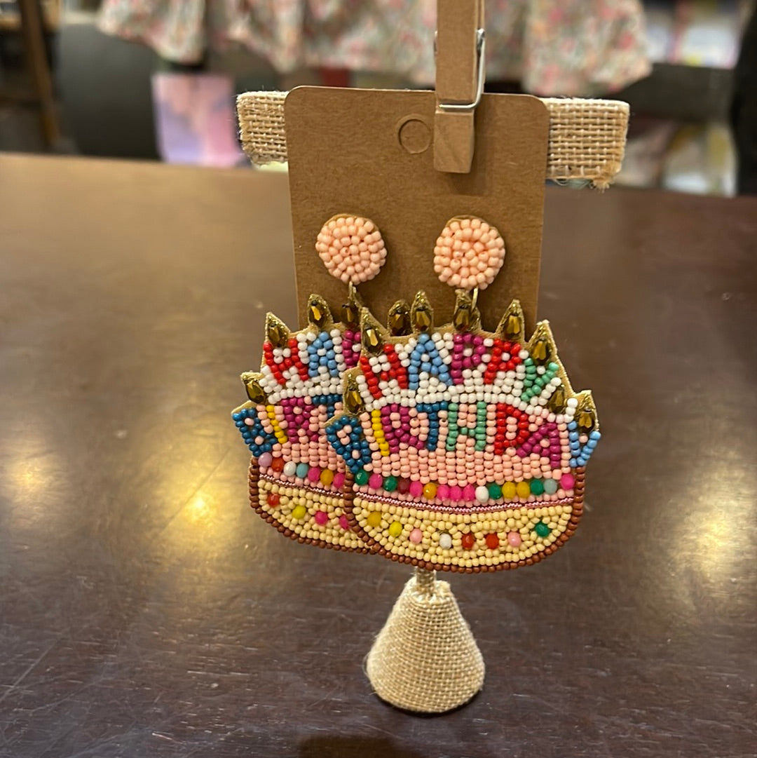 Beaded birthday cake earrings with multicolored beads.