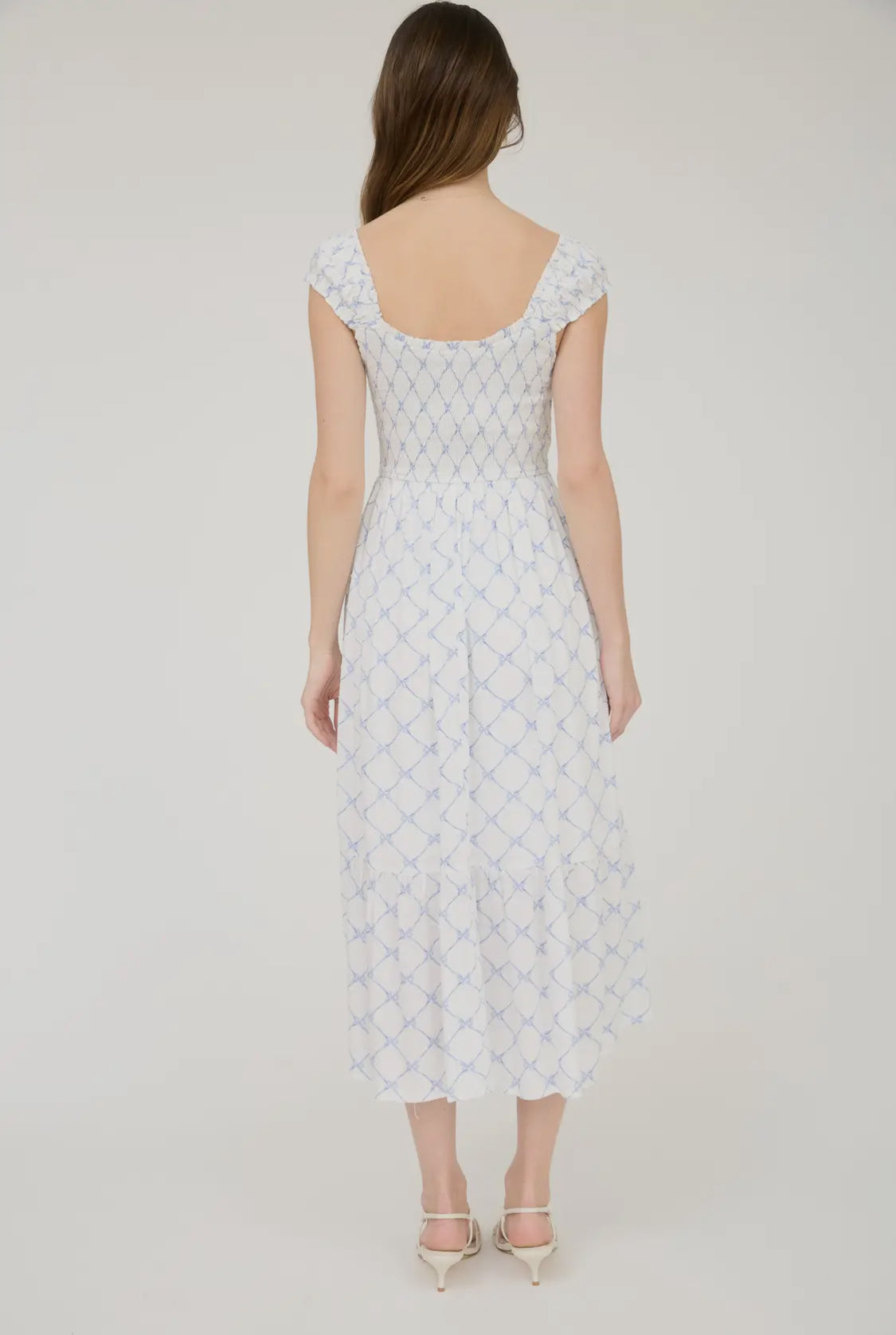 Bow Pattern Ruched Sleeve Smocked
Midi Dress