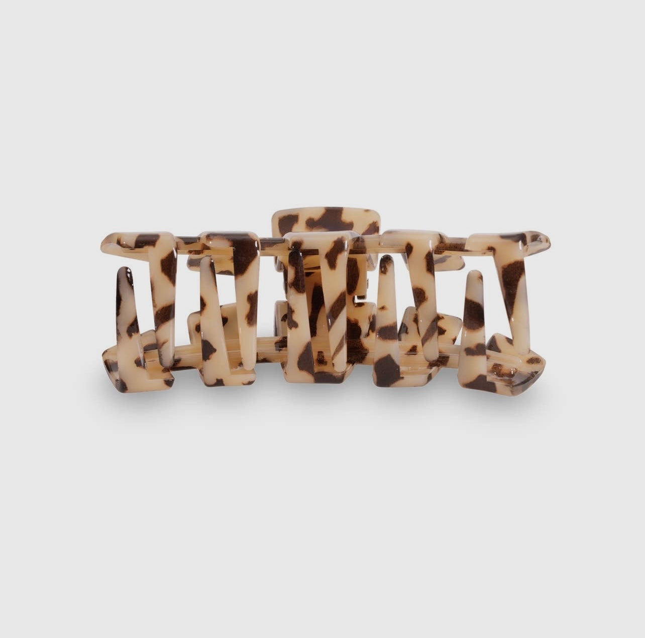 Blonde tortoise classic teletie claw clip.