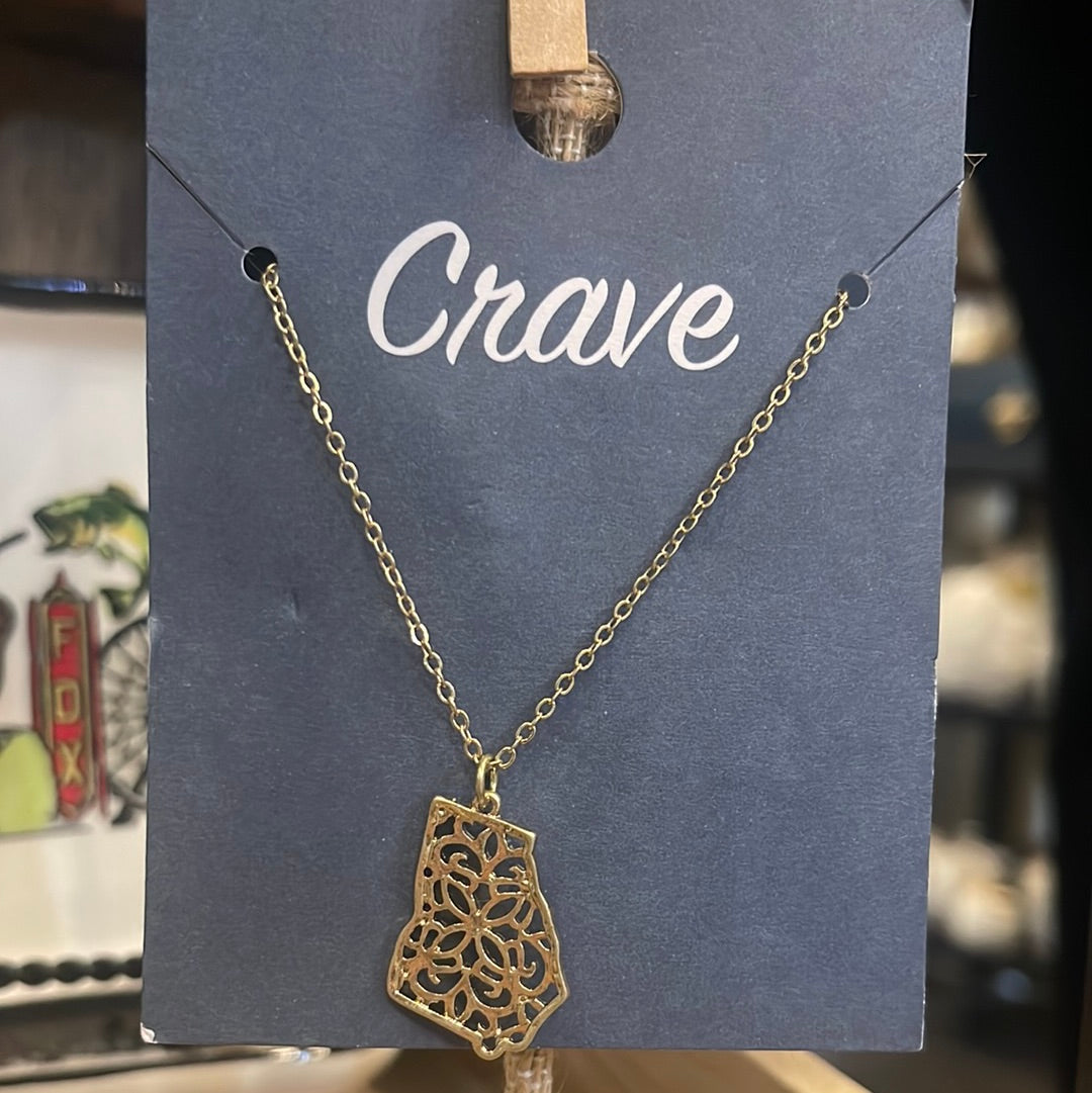 Golden necklace crafted into the shape of Georgia.