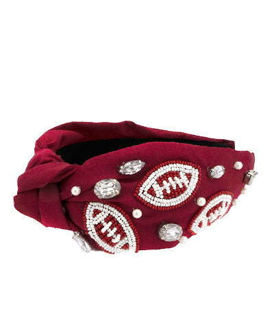 Burgundy beaded football topknot headband.