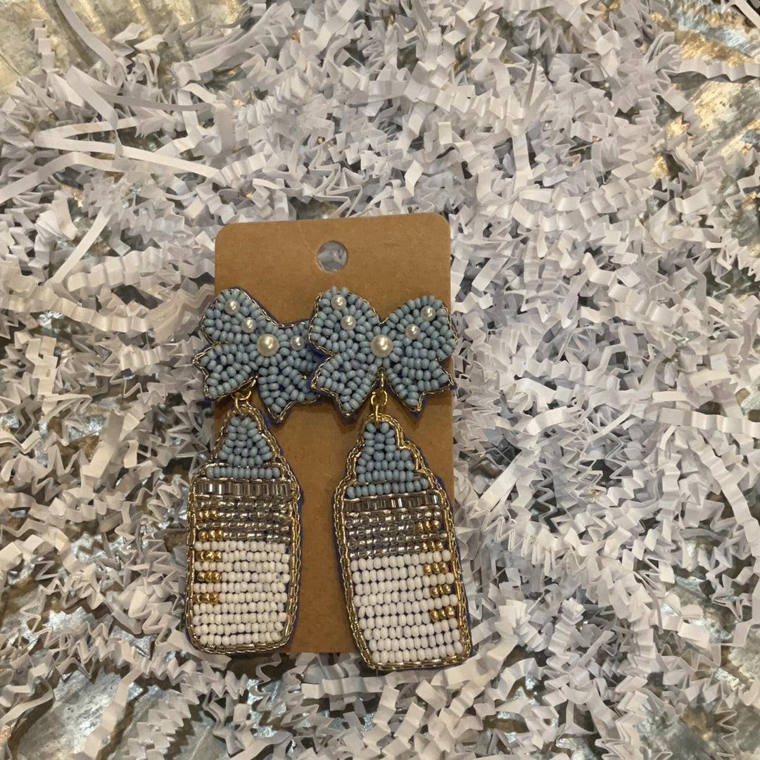 Beaded blue baby bottle earrings with blue beaded bows.