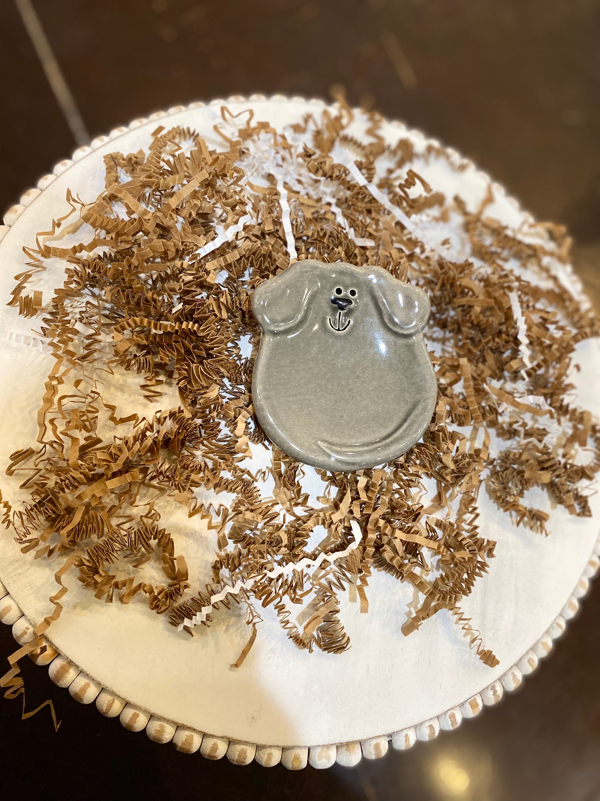 Small handmade gray dog ceramic dish.