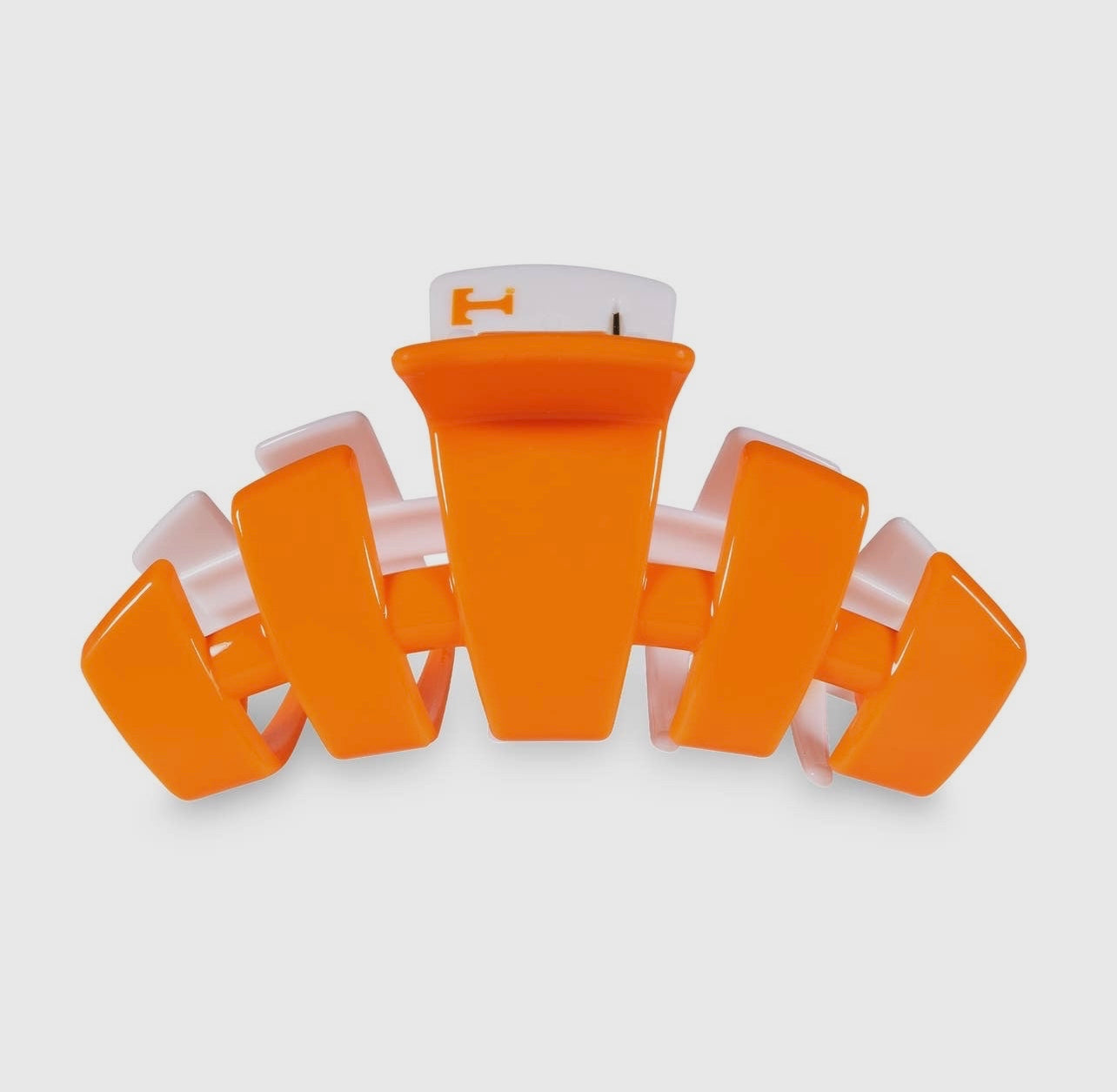 University of Tennessee Collegiate Teletie Claw Clip in orange and white. Side view.