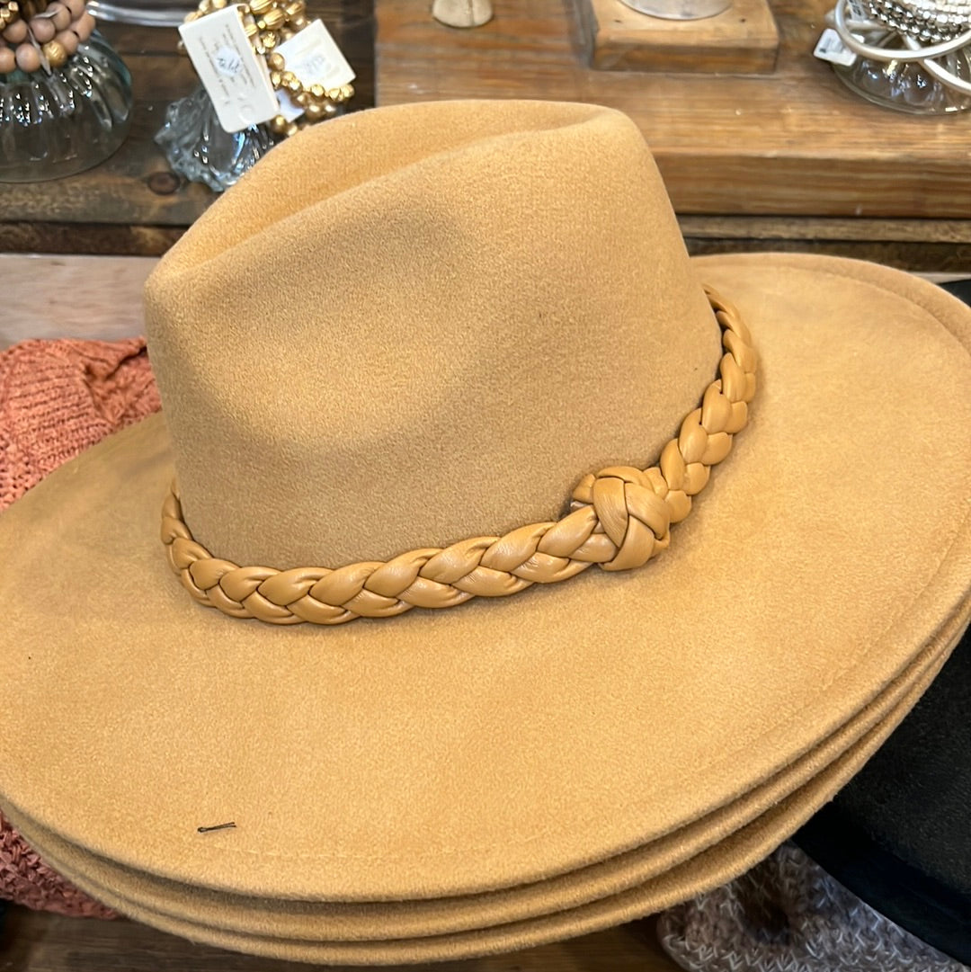 Tan and braided knot wide brim fashion hat.