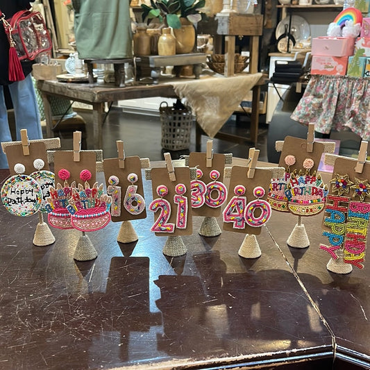 Assorted beaded birthday earrings.