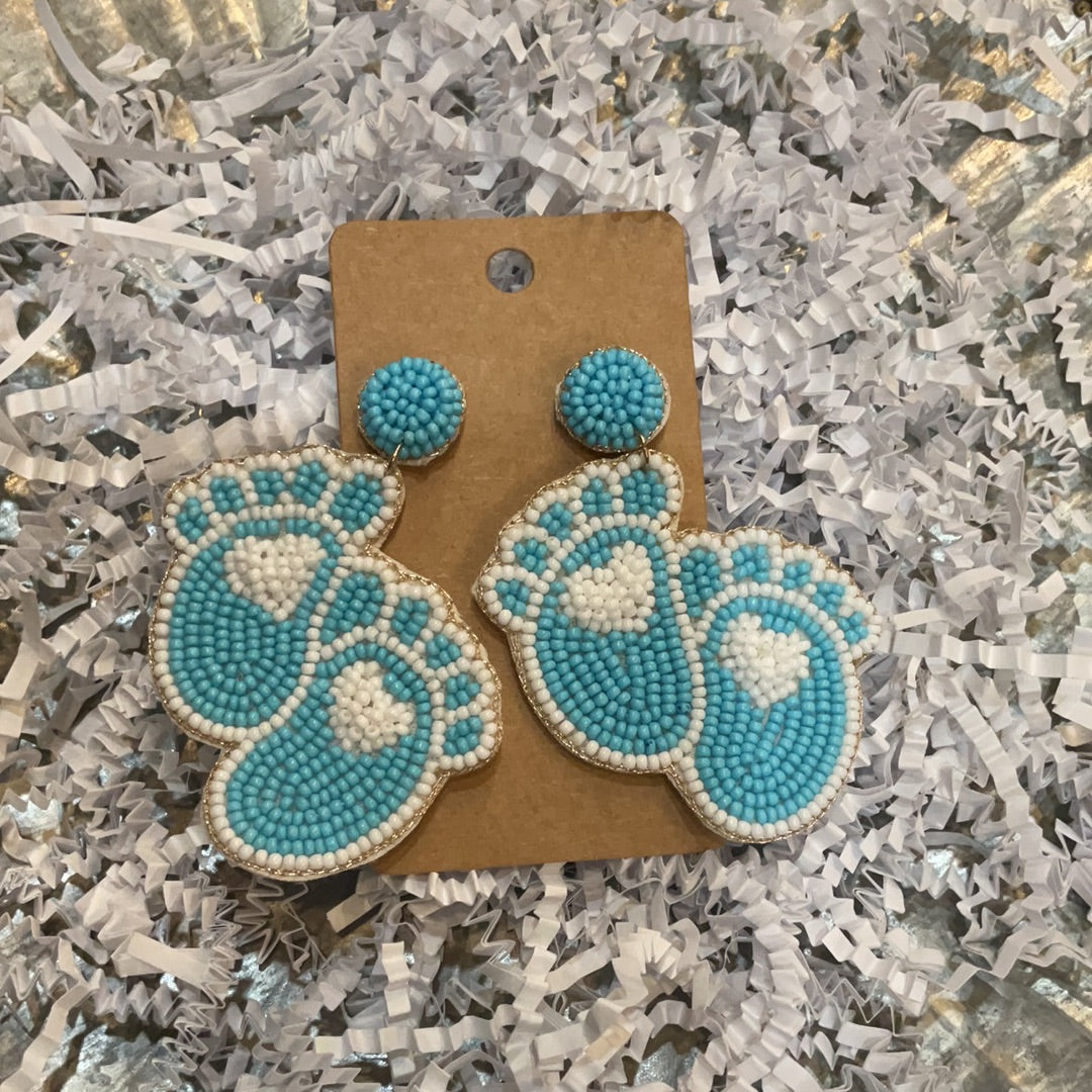 Beaded blue foot earrings.