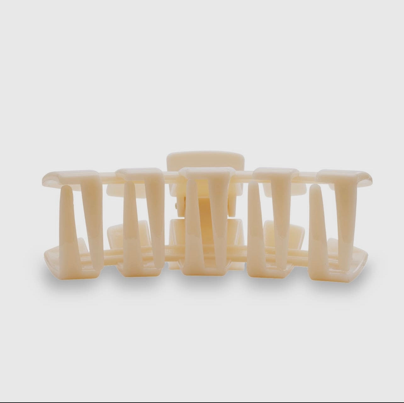 Almond beige classic teletie claw clip.