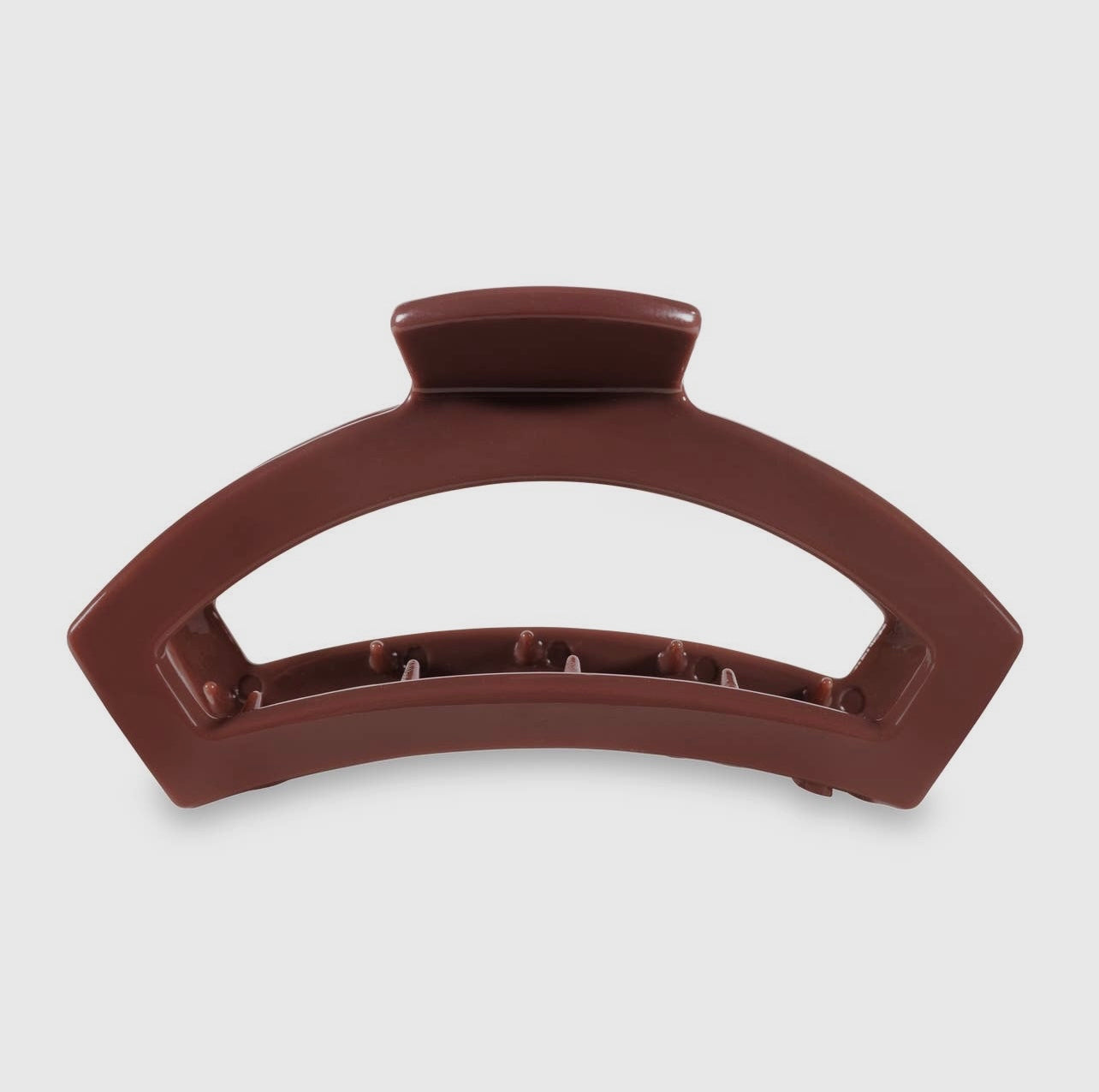 Nutmeg teletie open claw clip.