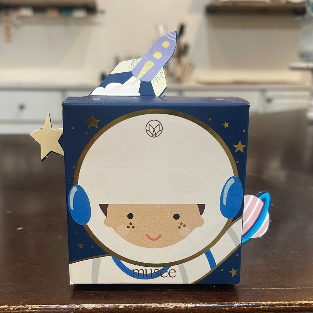 Playful astronaut themed bath balm.