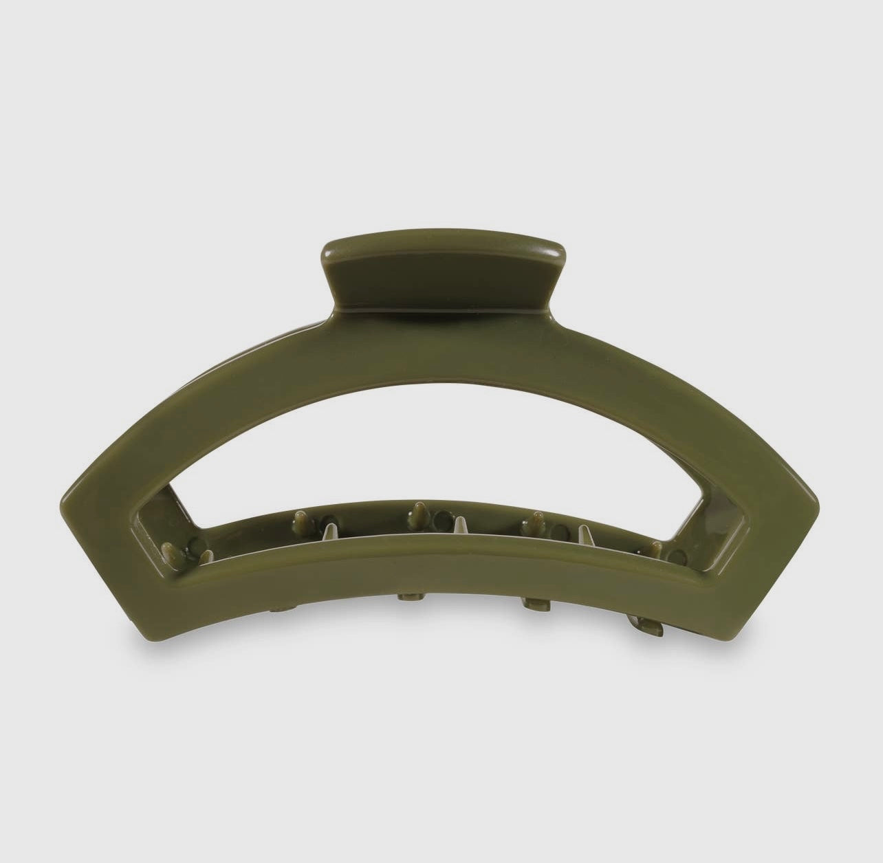 Olive teletie open claw clip.