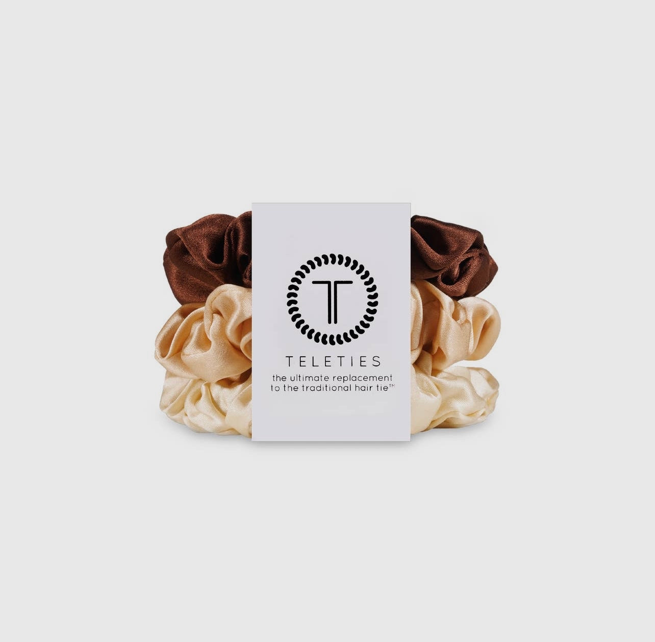 Neutral teletie silk scrunchies.