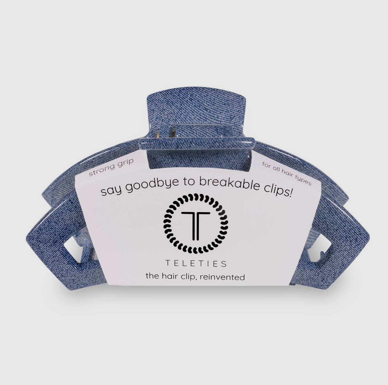 Denim teletie open claw clip.