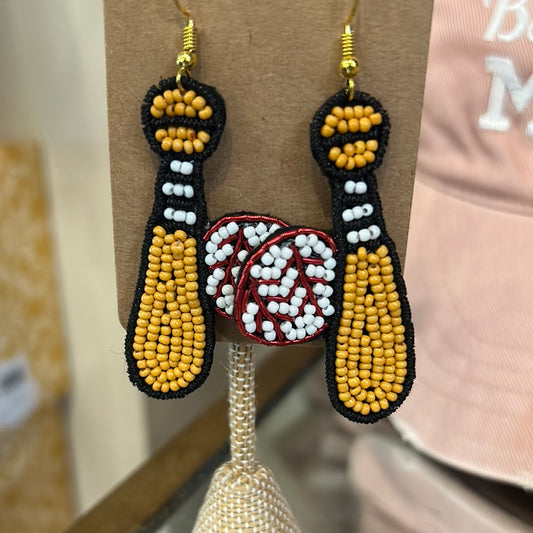 Brown beaded bat and beaded baseball earrings.