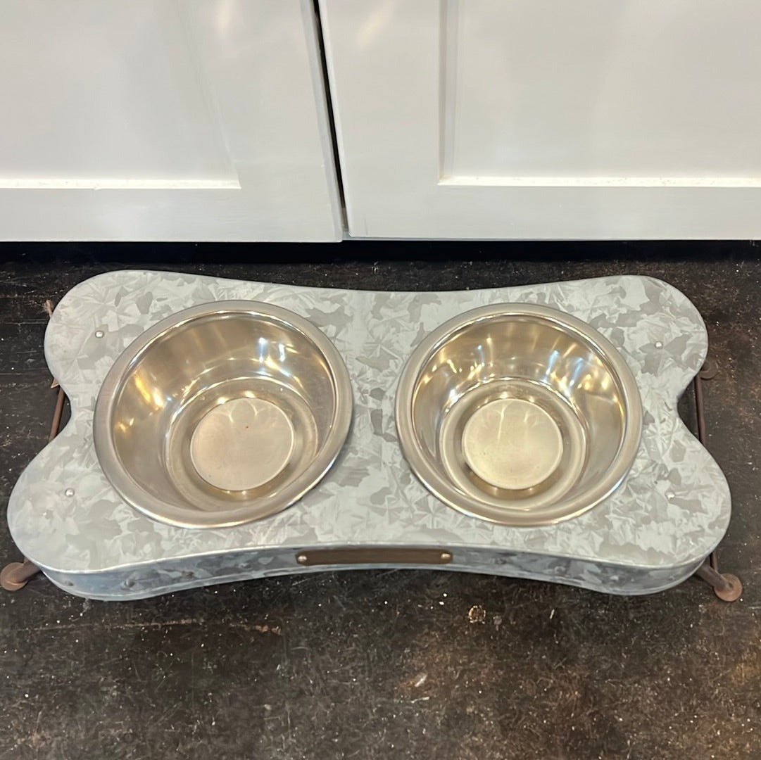 Bone shaped dog food bowl set.