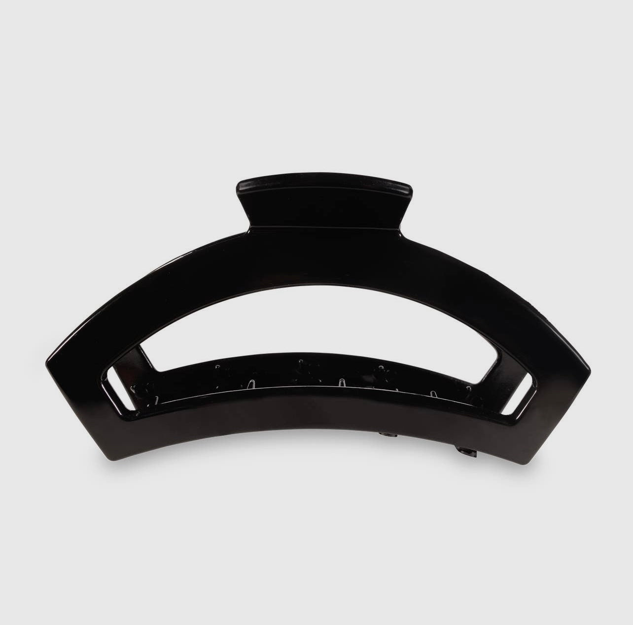 Jet black teletie open claw clip.