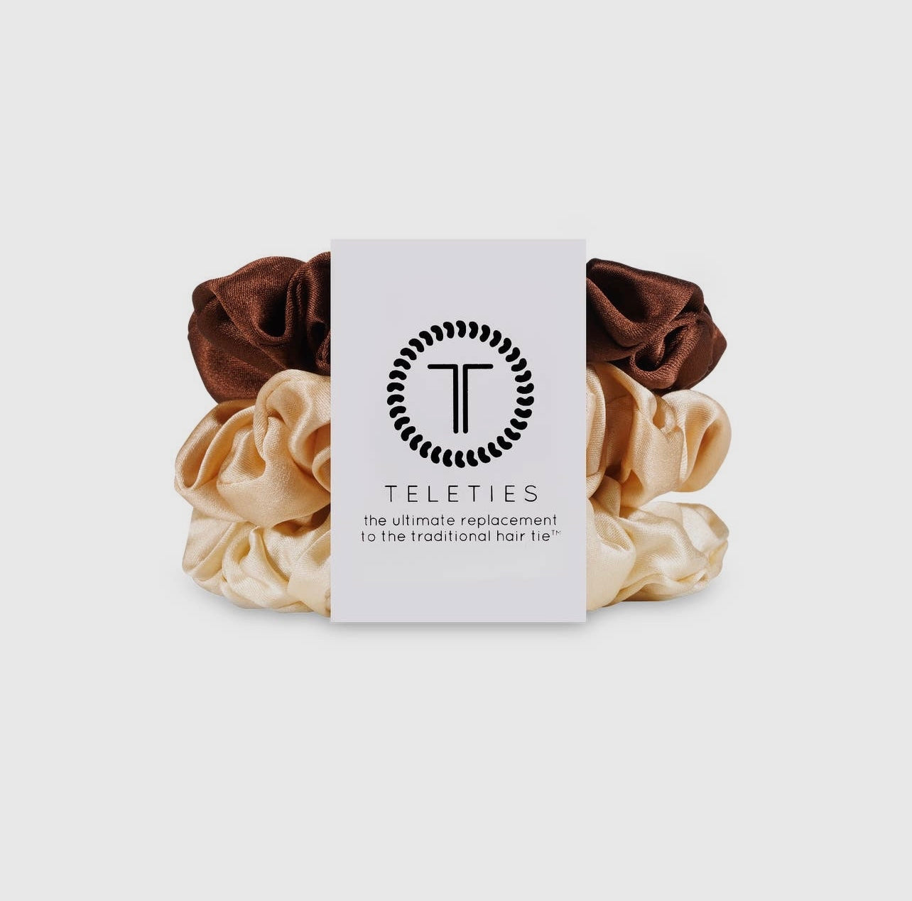 Neutral teletie silk scrunchies.