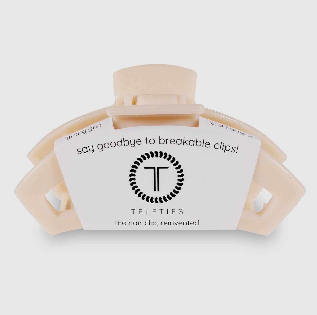 Almond beige teletie open claw clip.