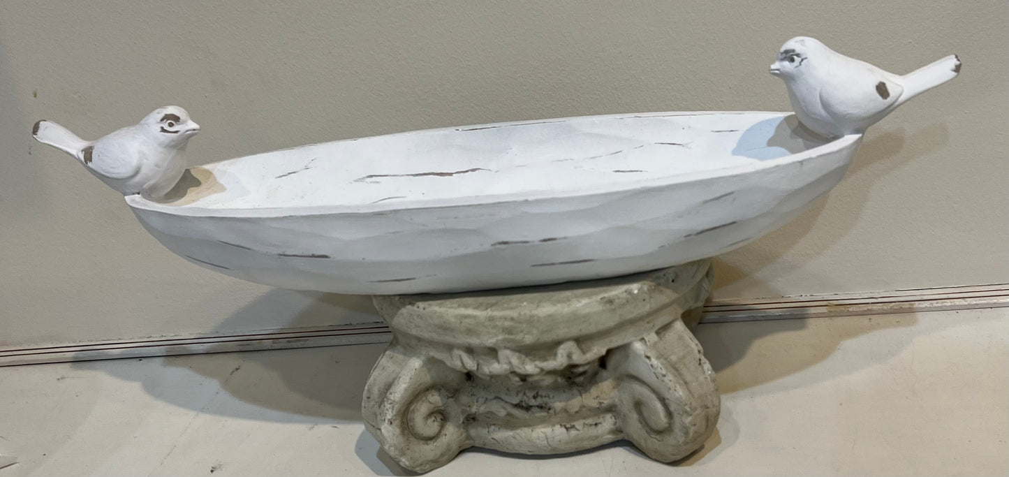 White-washed dough bowl with birds on each end.