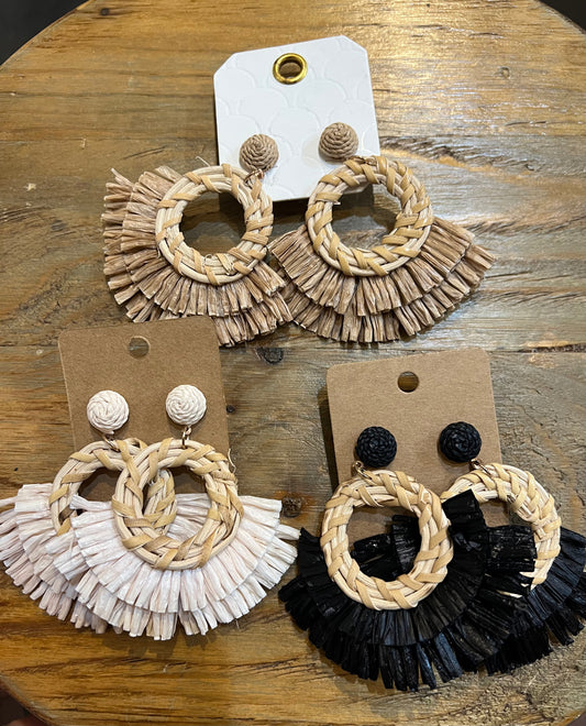 Assorted raffia fringe earrings.