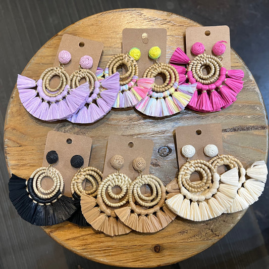 Assorted raffia tassel bamboo earrings.