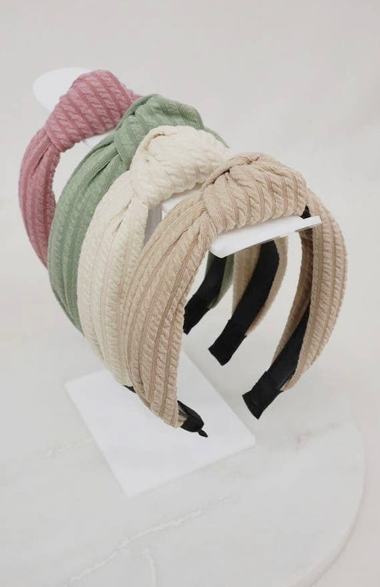 Assorted ribbed topknot headbands.