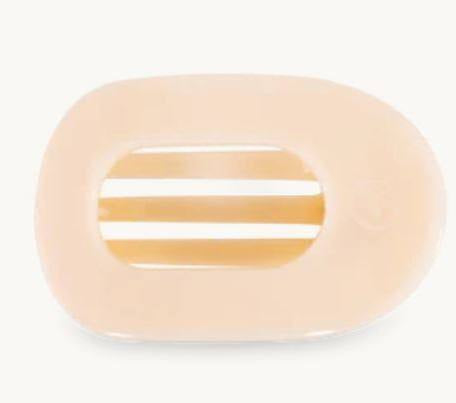 Beige teleties flat round clip.