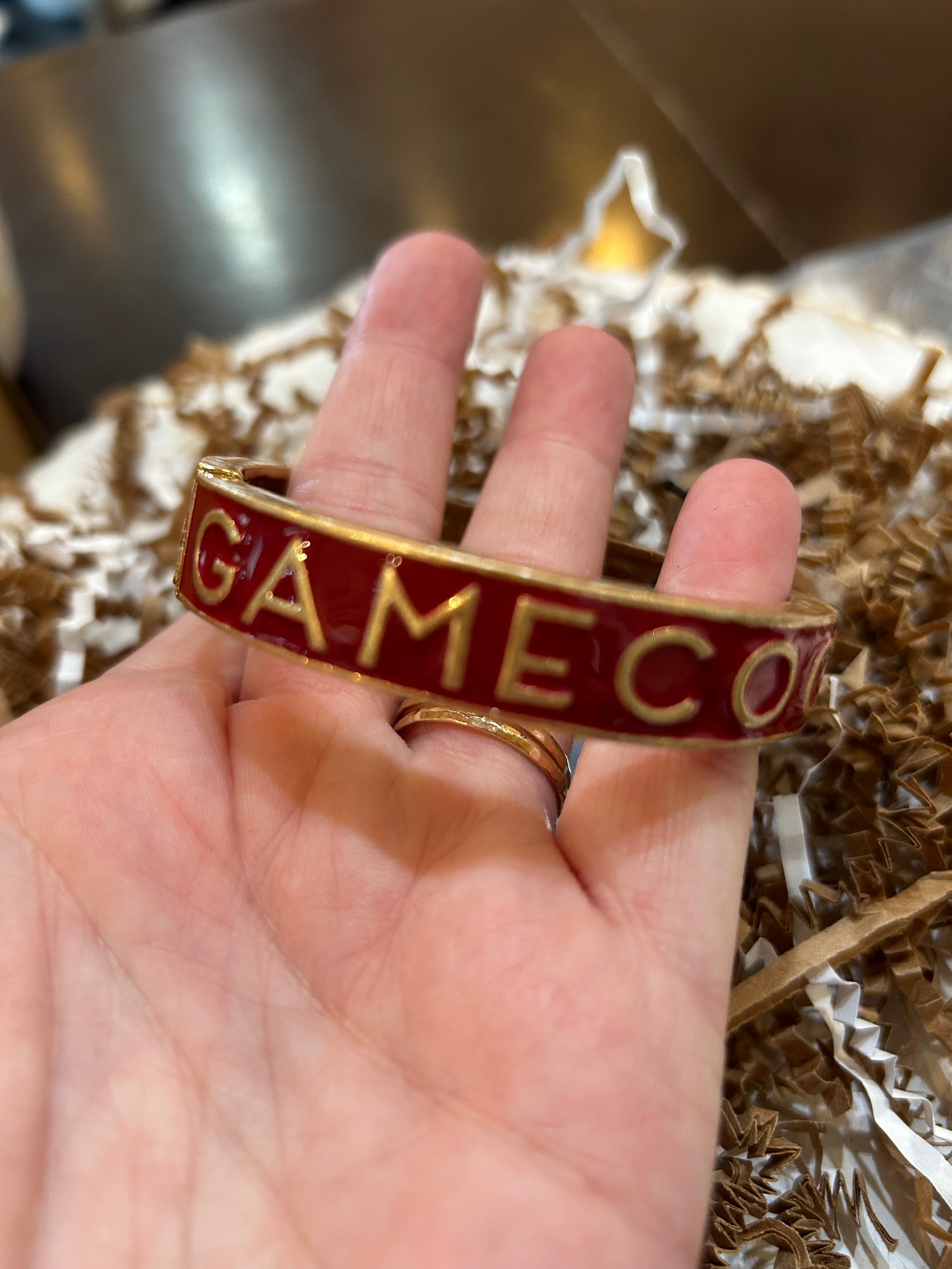 Gold and red College Enamel Hinge Bangle with "GAMECOCKS".