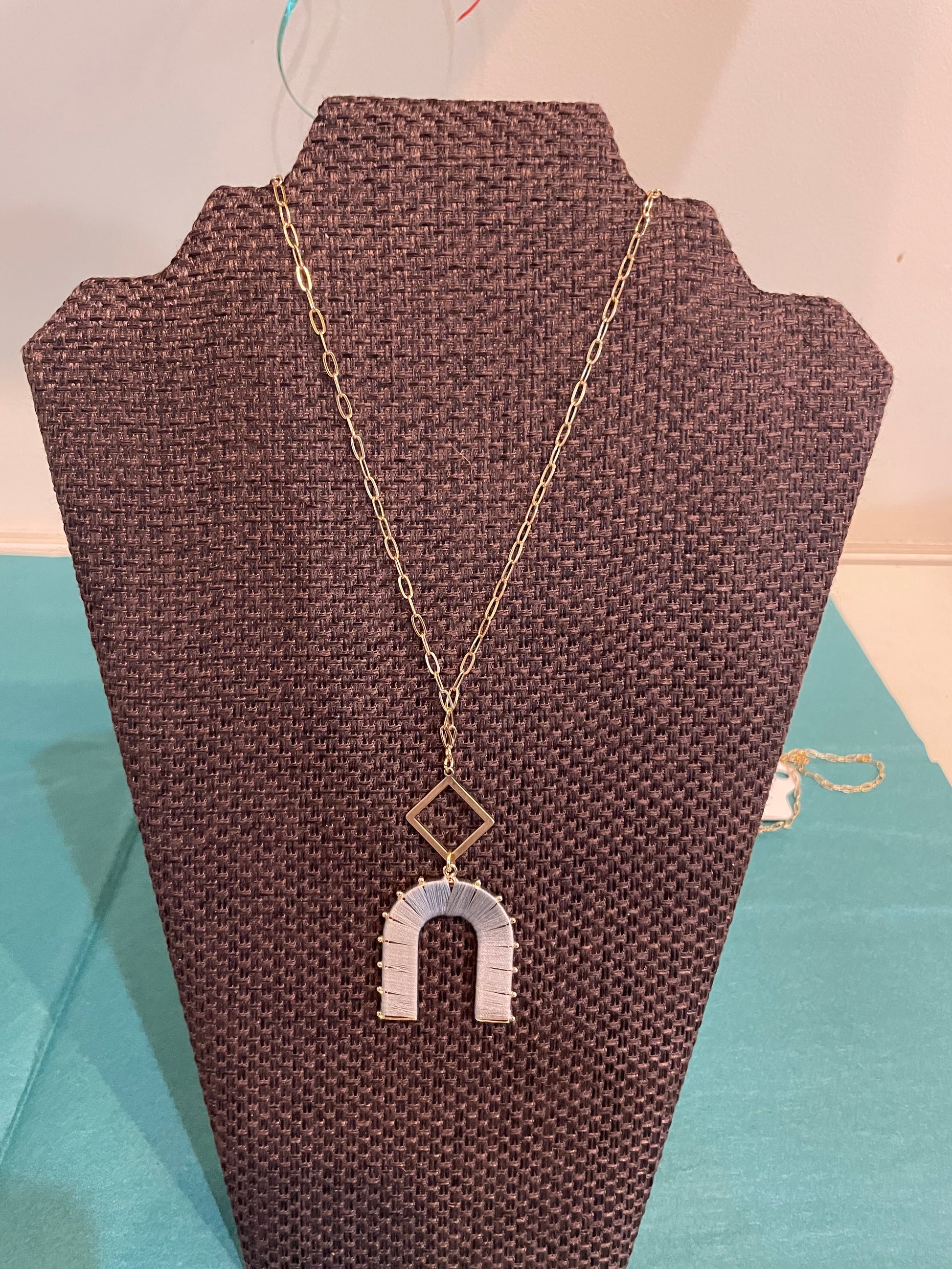 Gray Matte Gold Diamond Threaded U-Shaped Necklace.