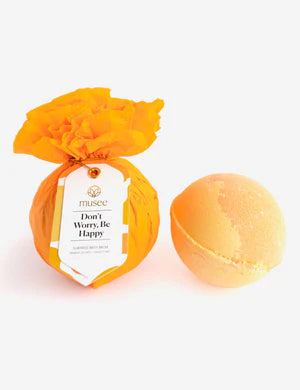 Orange "Don't Worry Be Happy" Musee bath balm.