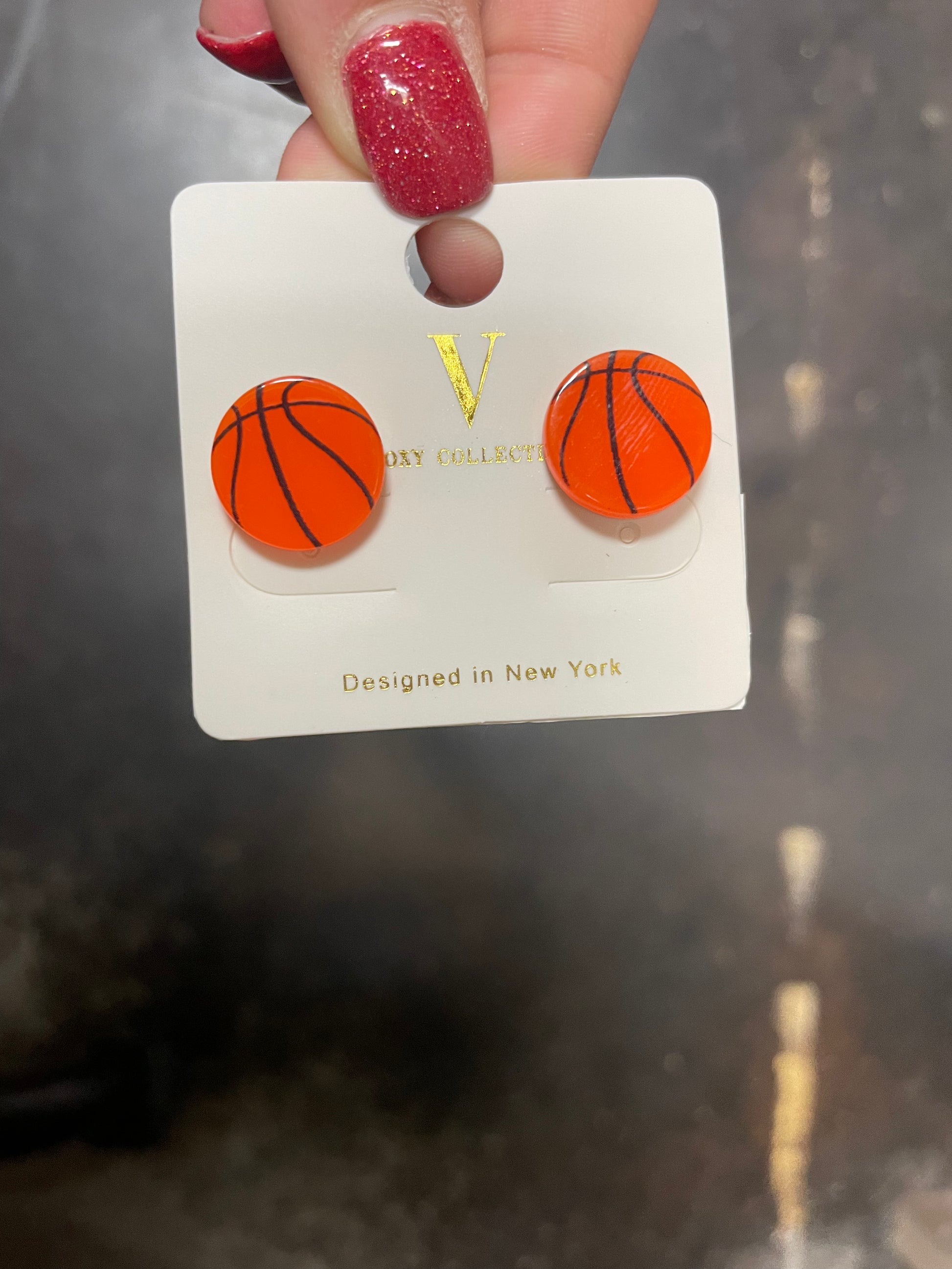 Basketball stud earrings.