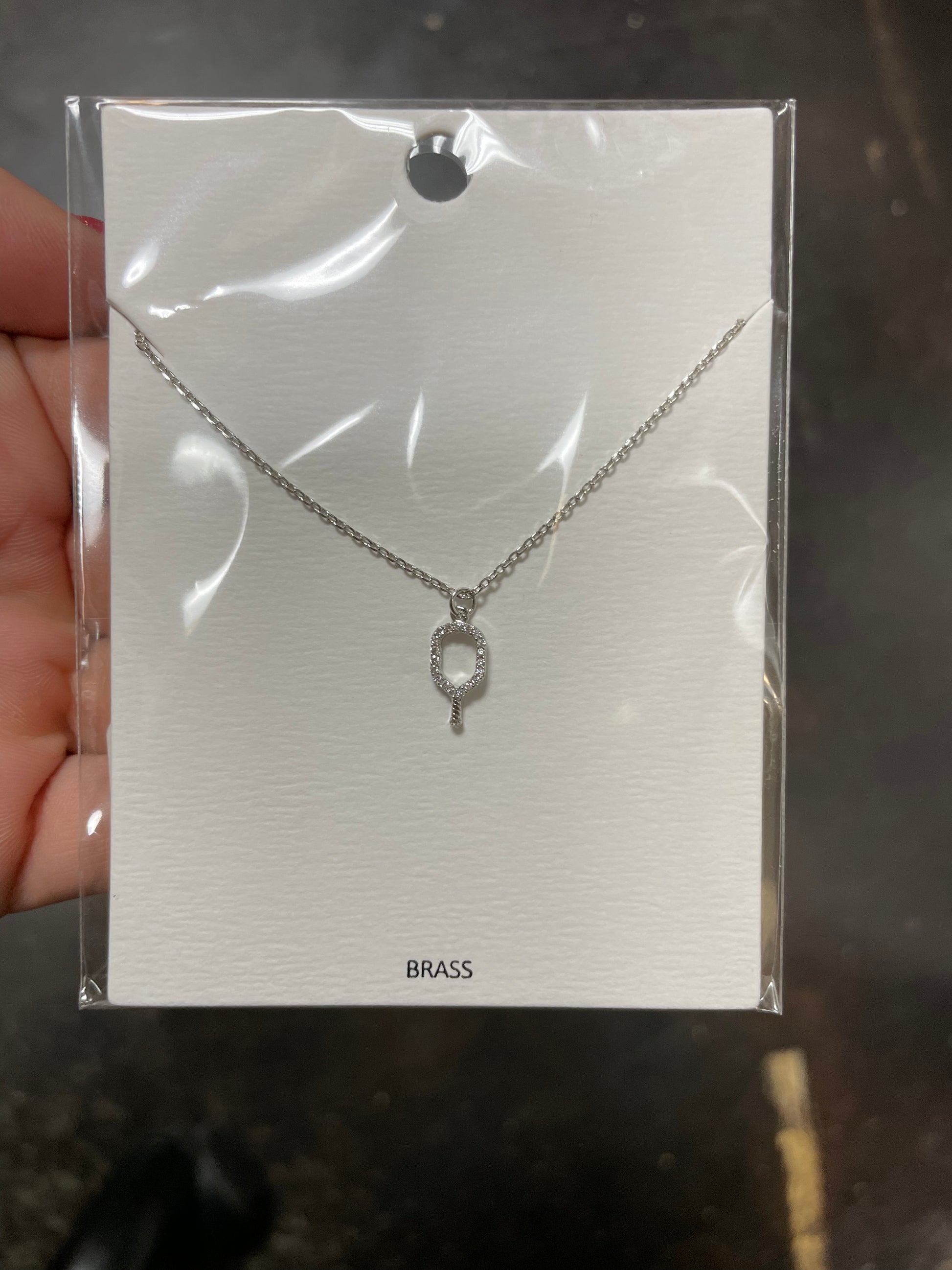 Rhodium Pave Outline Pickleball Pendant Necklace.