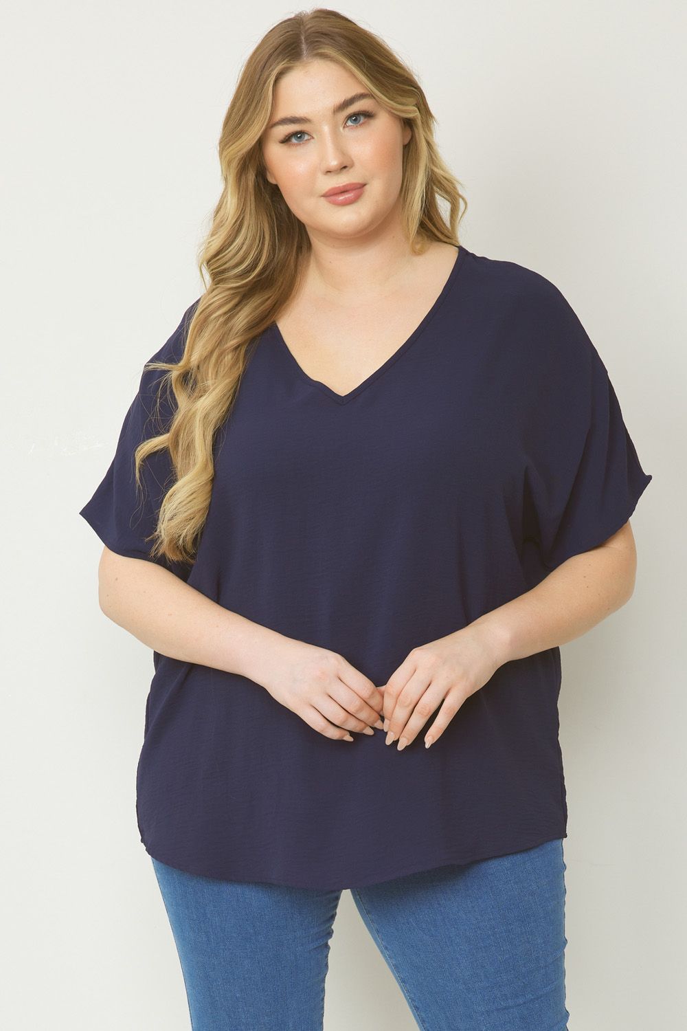 Women's navy blue basic v-neck shirt.
