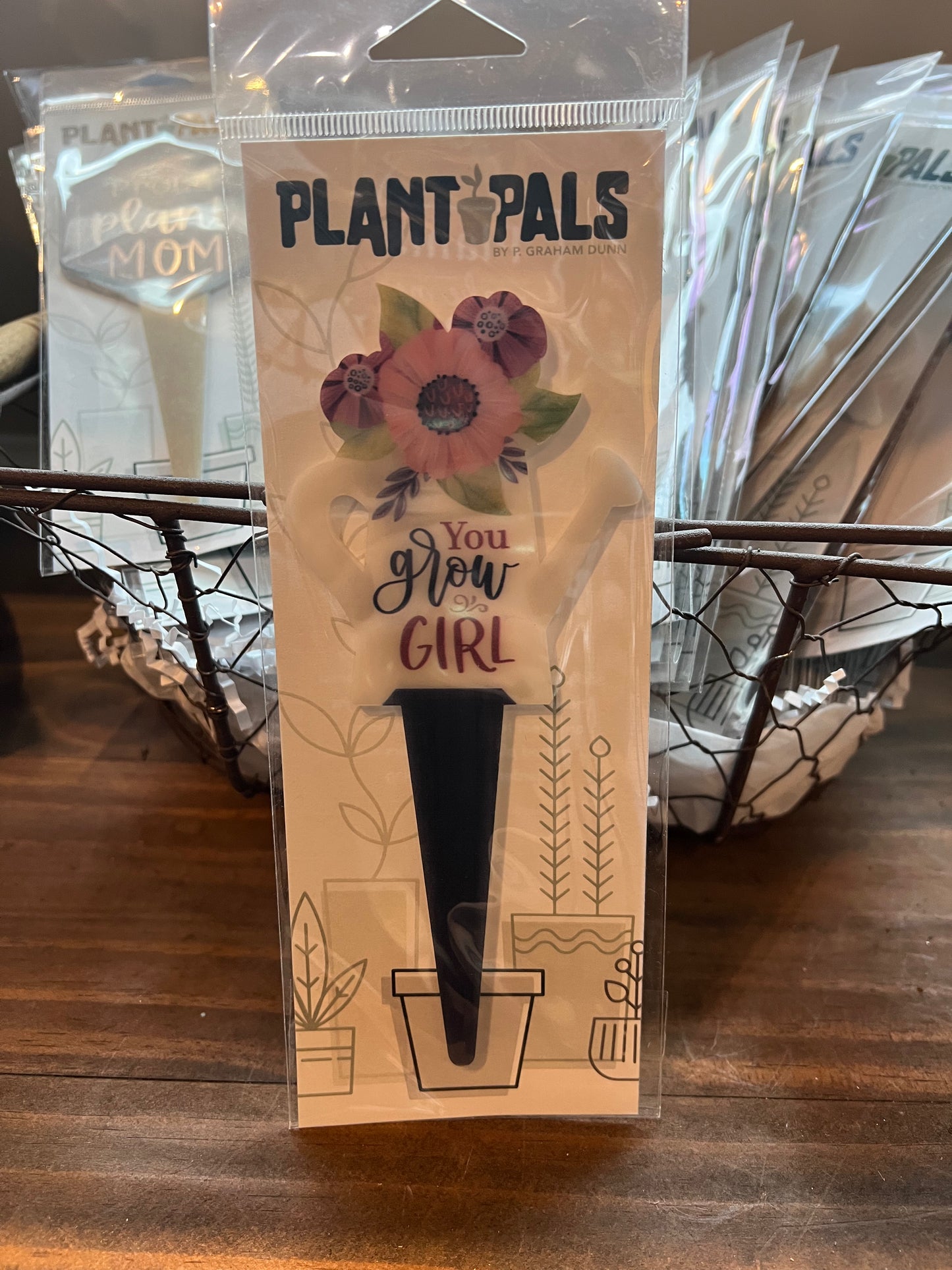 Floral "You Grow Girl" plant pal sign.