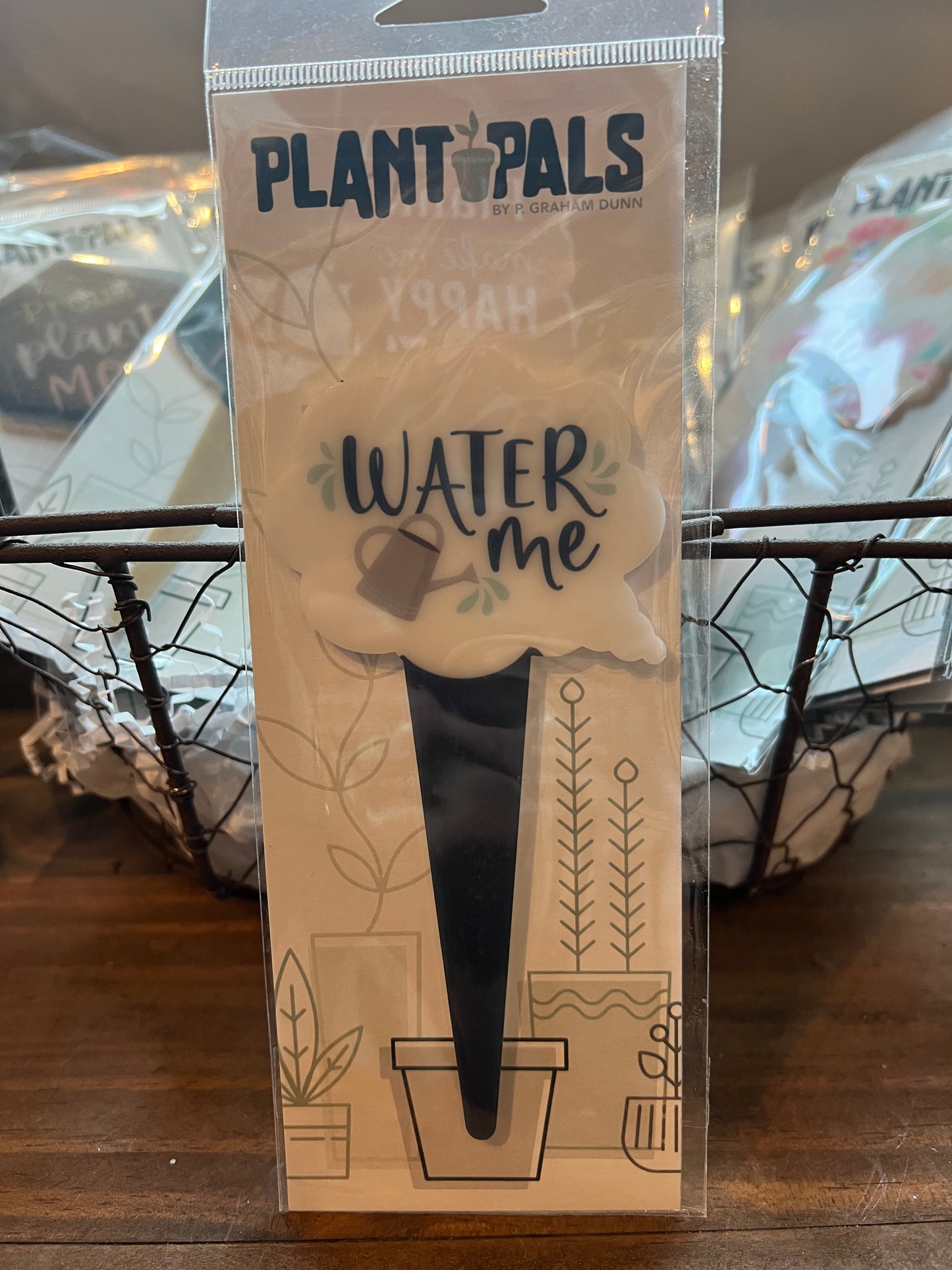 Watering can "Water Me" plant pal sign.