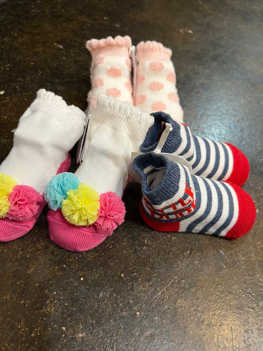 Assorted baby socks.