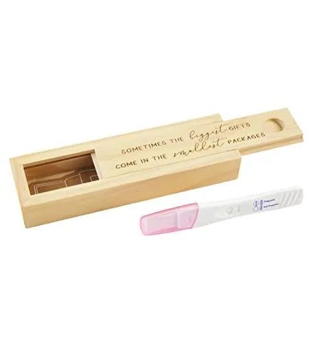 Rectangular wooden box with "Sometimes the biggest gifts come in the smallest packages" inscribed.