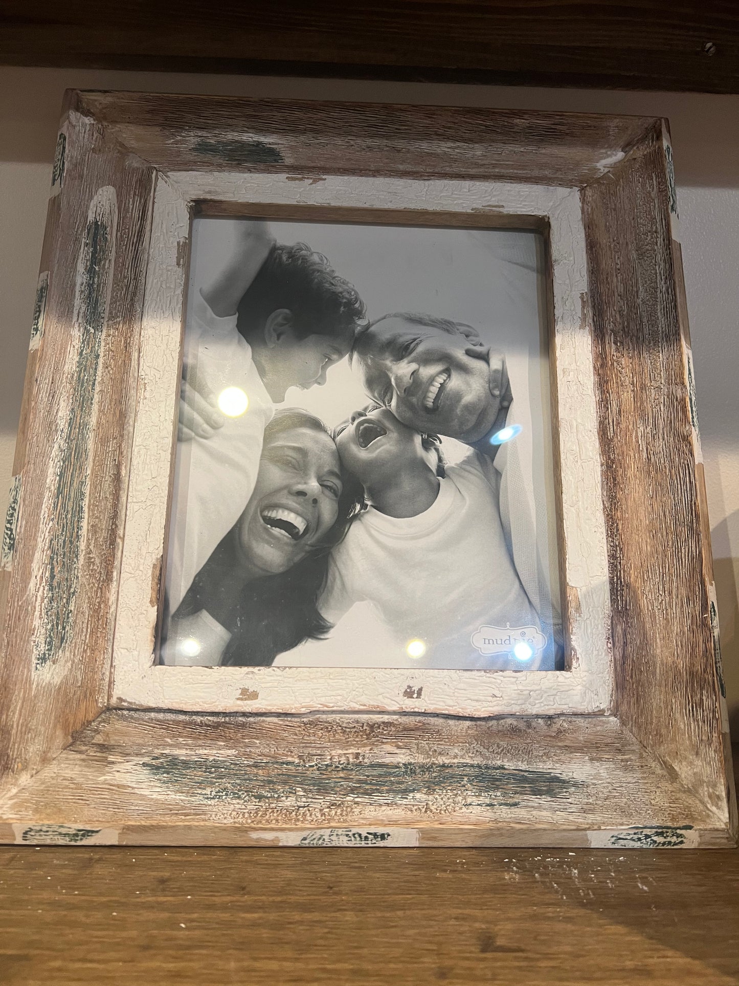 Brown and white weathered picture frame.