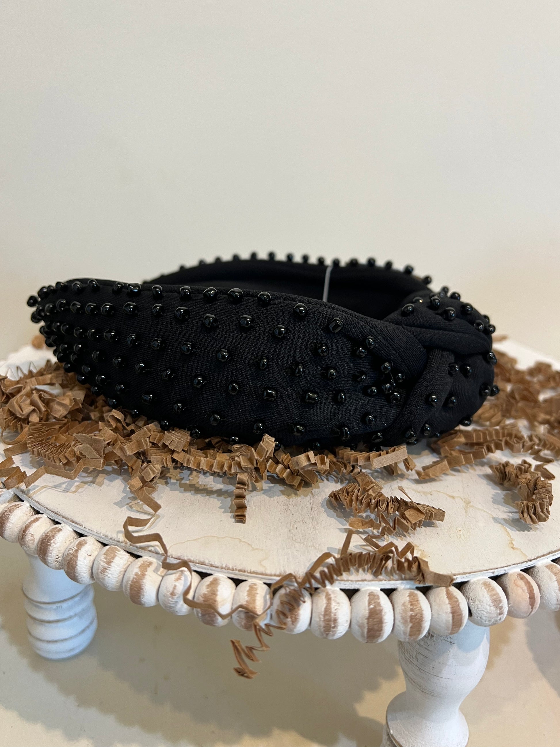 Black top knot headband with black beads.