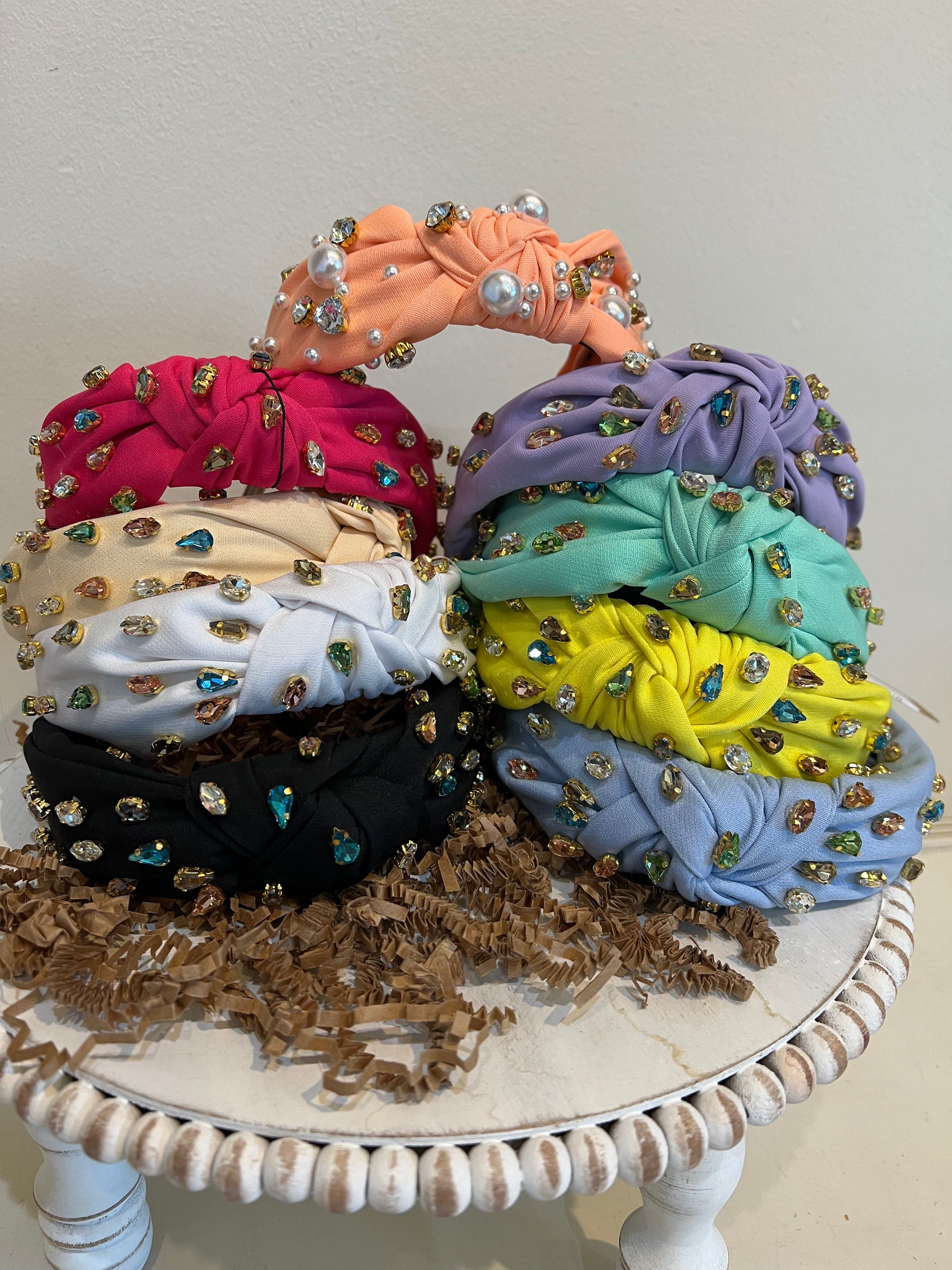 Assorted multicolor jeweled headbands.